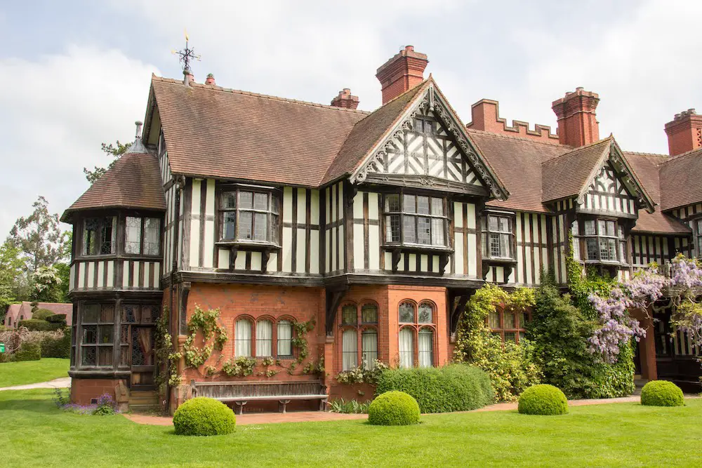 view of wightwick manor tudor mansion and the neatly presented lawns surrounding the building