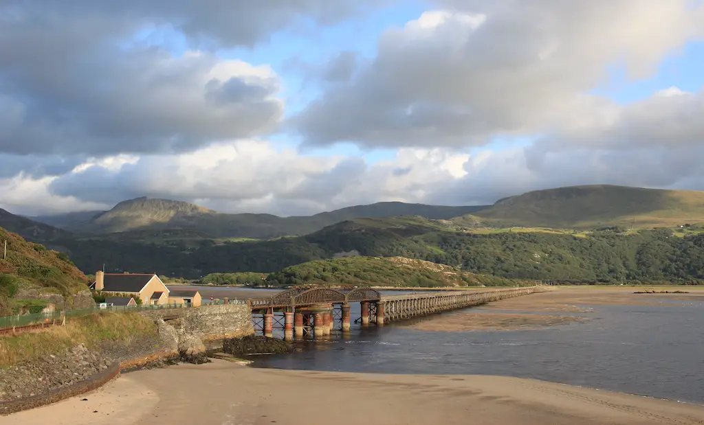 view of the bridge over the mawddach estuary in wales