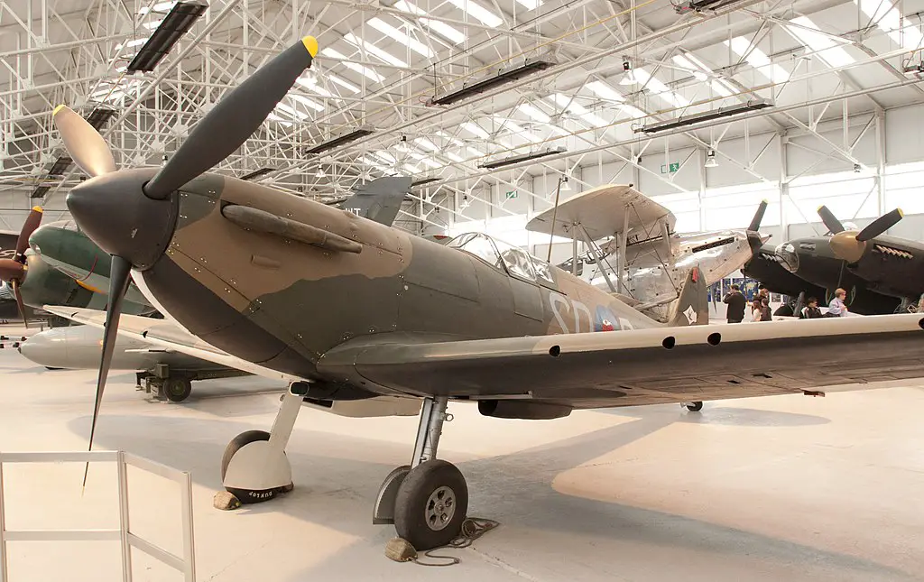 a spitfire plane on display at the raf museum