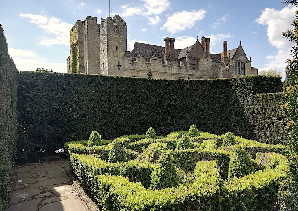 a view of Hever Castle from inside the maze