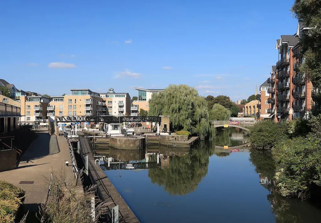 view of brentford lock with buildings in the background