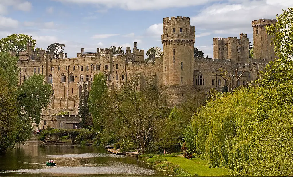 warwick castle in front of the river avon, england